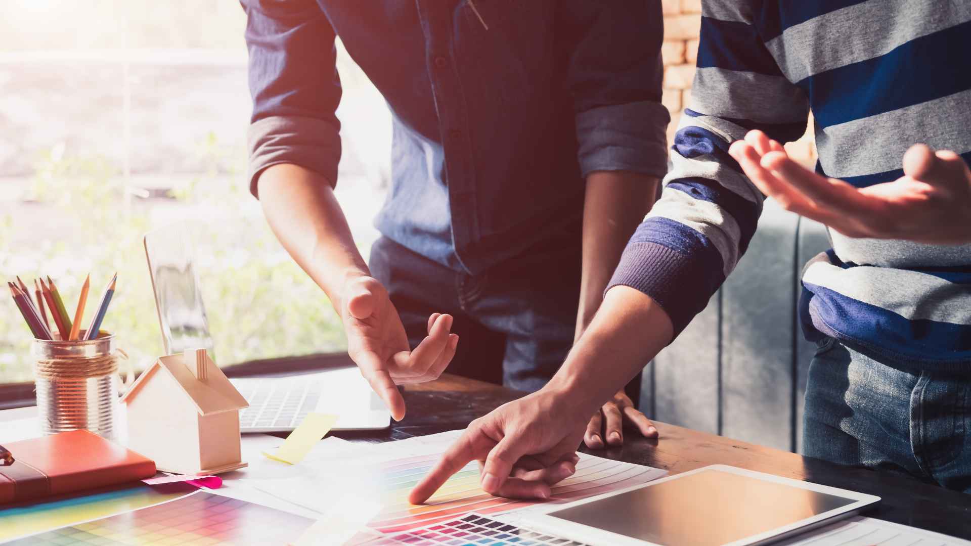 Professional web development team collaborating on custom digital solutions for business growth